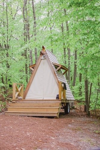 Tiny A-frame cabin for glamping at Sandy Pines campground in Southern Maine