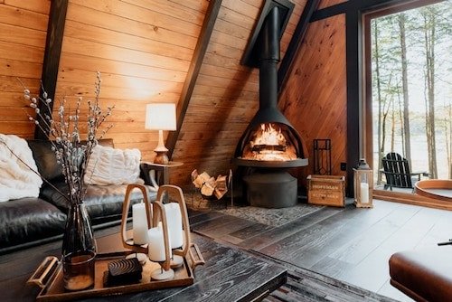 romantic getaways Catskills need a roaring fireplace, a front porch with sweeping views, and modern amenities like Wi-Fi