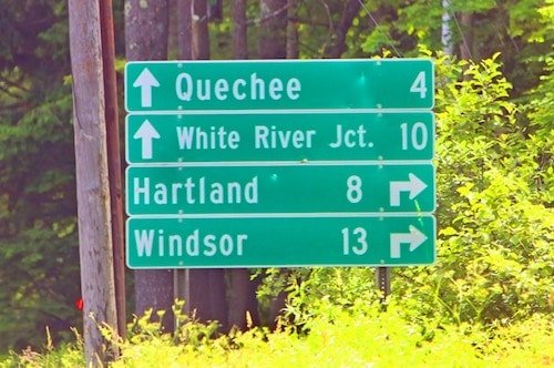 Signs directing residents and tourists to other nearby towns from the center of town, near the middle school