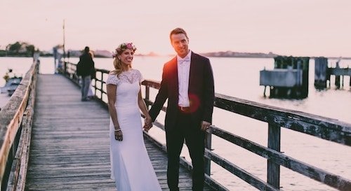 Coastal-themed wedding decor with personalized venue arrangements
