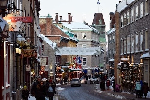 Charming streets of Old Quebec at Christmastime, lined with cute shops