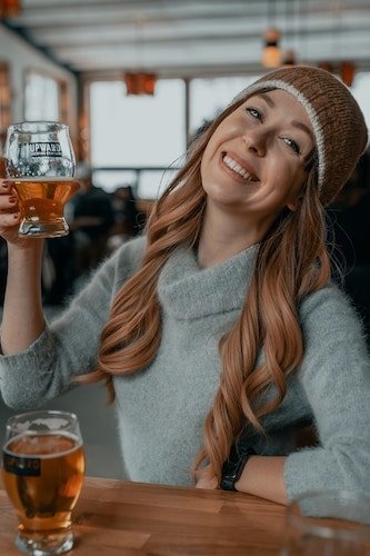 Woman enjoying a local brewery in Livingston Manor