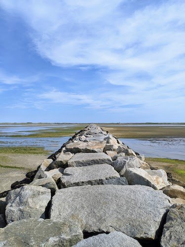 causeway leading to Wood End from Pilgrims Landing Park