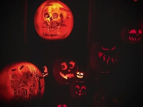 Lit Jack O'Lantern in the dark at Roger Williams Park Zoo means fall in Rhode Island