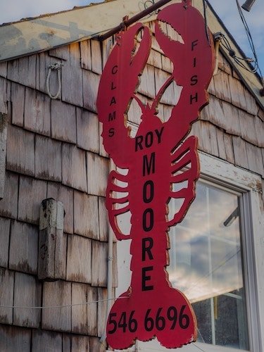 Sign for Roy Moore, the best place for a lobster roll