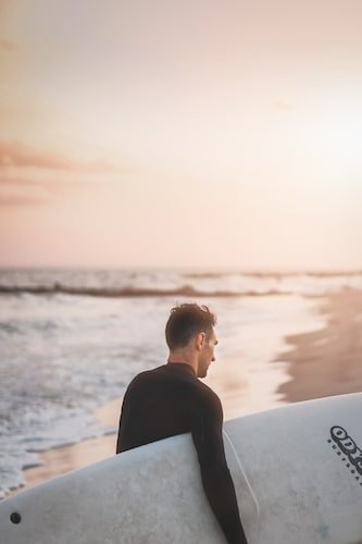 Surfer at Rockaway Beach