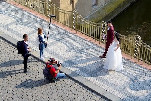 A group of wedding photographers capturing candid moments at weddings in Connecticut