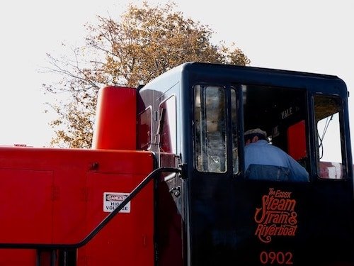 Locomotive conductor operating the train welcoming visitors to the main event