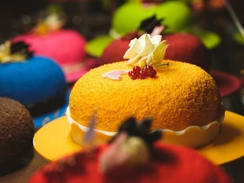 Colorful coffee cake at a wedding reception on a glorious wedding day