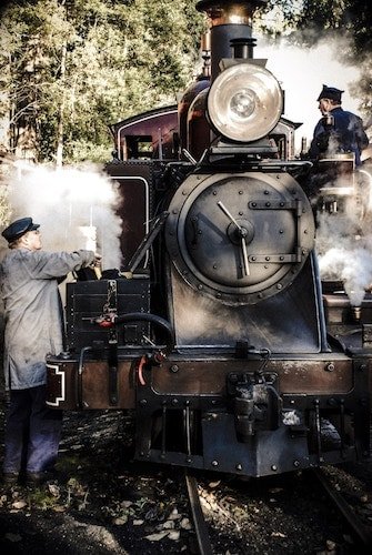 Workers getting the train in motion