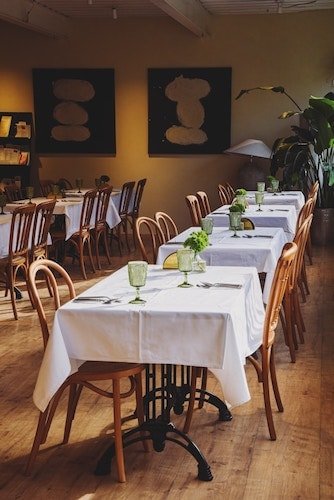 The dining room of a qualifying restaurant on the Quinnipiac River