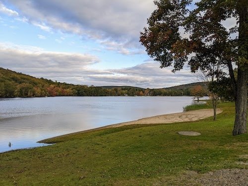 Trying to capture the unrippled lake surface and picturesque setting of Lake Waramaug State Park