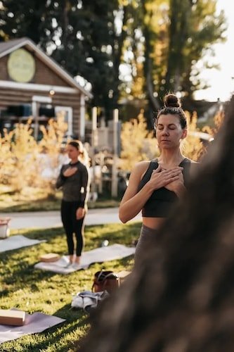 Groups of women gathered for one of the top yoga retreats in New York State