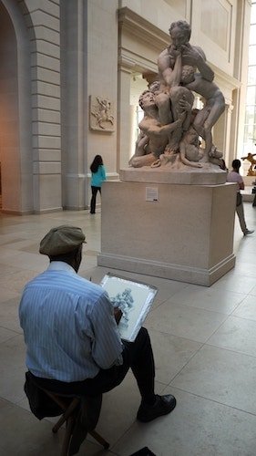 Artist sketching a sculpture at the Metropolitan Museum of Art in New York in February