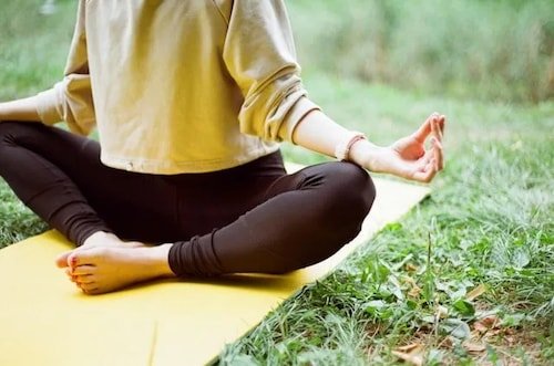 Yoga class on the grass in Greenwich, Connecticut