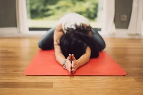 Woman practicing yoga in Greenwich, CT