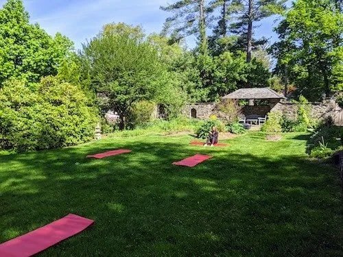 Serene garden with morning yoga session at one of the best yoga retreats in ct