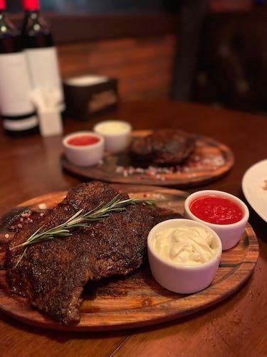An Italian steakhouse, highlighting exceptional service. I bet you can just taste this photo, no?