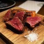 Steak plate with salt served at one of the best steakhouses in Greenwich CT