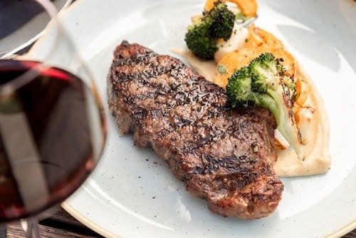 An inviting steakhouses in Stamford, CT, with one of a variety of dishes.