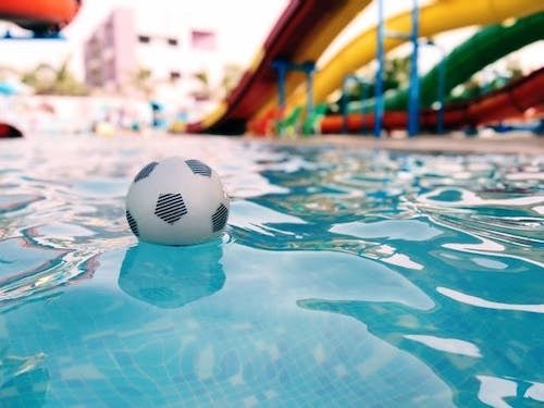 Water view of a toy floating in one of the year long amenities available along the shore