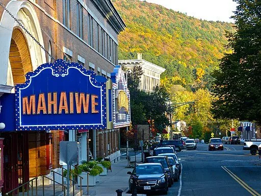 The marquee sign of the Mahaiwe Arts Center, the mountains in the background