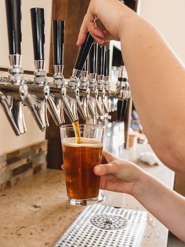 Topping up a beer near Bluff Point State Park