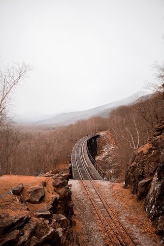 A scenic snow train track over woods in the White Mountains of New Hampshire