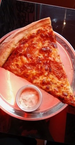 New York style pizza, one of many examples of delicious food here