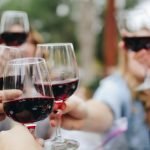 Group of friends enjoying pinot noir at one of the best wineries in Fairfield County CT
