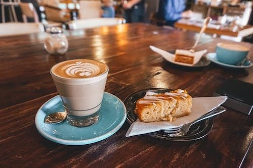 Coffee and a pastry at a charming local coffee shop