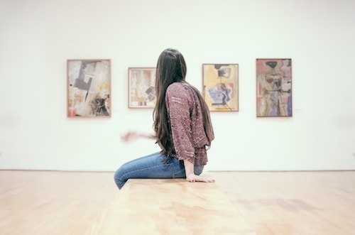 Woman admiring art at a museum in Northeast CT