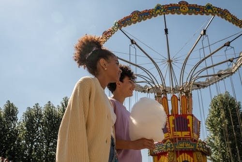 Smiling teenagers explore a theme park in Connecticut