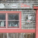 Faded paint on the wall of a Connecticut lobster shack