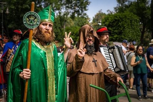 Two men dressed for a Saint Patrick's Day parade to celebrate Irish culture and the legacy of Irish immigrants