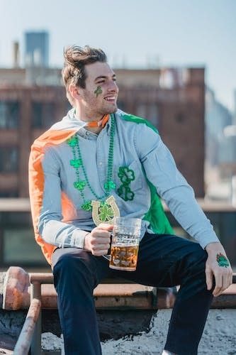 Boston Celtics fan enjoying live music at St Patrick's Day events