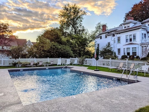 July In Greenwich Ct: Everything You Need To Know 9 The outdoor pool at Stanton House Inn at dusk