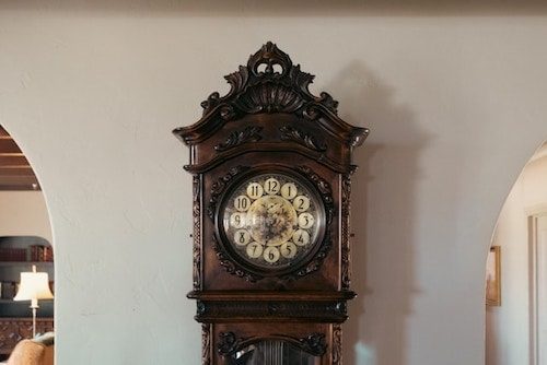 Things To Do In New Bedford Ma: Top 10 Most Unique Spots 11 Antique clock in the parlor of a local New Bedford Massachusetts inn