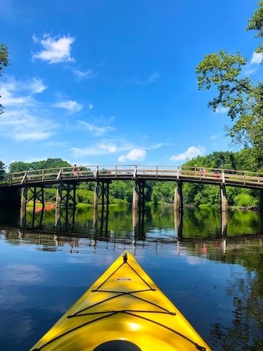 Kayaking towards the Old North Bridge in Concord, MA, one of the top monuments in the area, in October