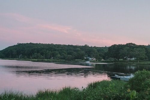 Sunset over the Mystic River in Mystic, Connecticut, on a day well spent on a Connecticut road trip