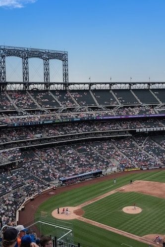Citi Field to watch the New York Mets, lemon ice king cone in hand