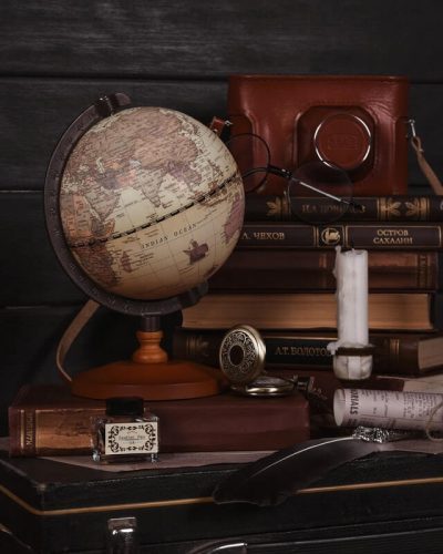 globe, vintage furniture, and other items on display at a Connecticut antique store