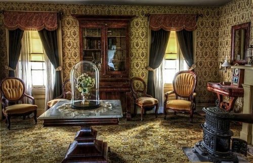 living room full of beautiful antiques with historic appeal