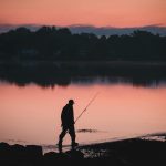 Connecticut Shoreline: Top 23 Most Unique Spots 12 fisherman walking along the shoreline in coastal Connecticut