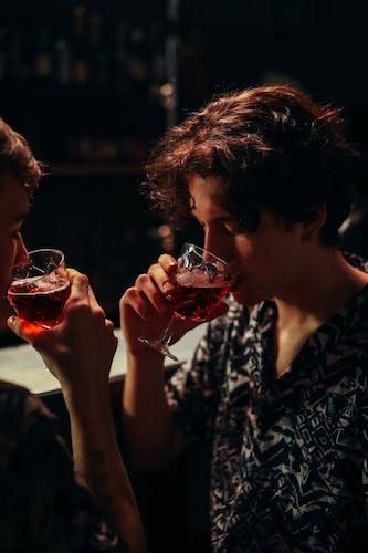Local gay couple confirm their affection over a drink at date night