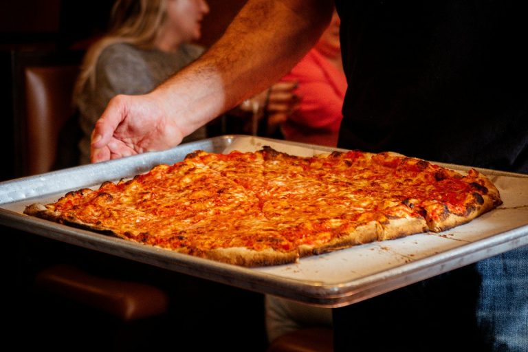 New Haven apizza from BAR, served hot and on an unpretentious metal tray