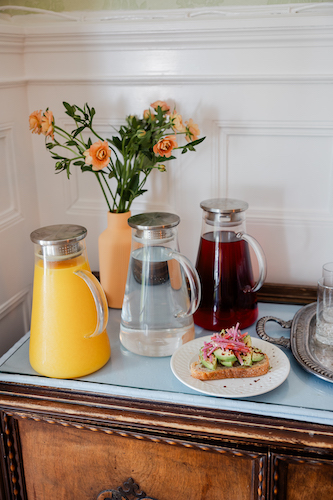 breakfast includes items like avocado toast in the dining room