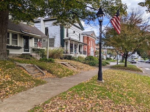 Plan a New England itinerary that includes a trip to New Milford and its adorable town green