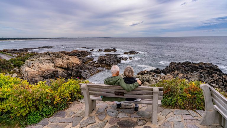 Coastal Towns In New England: Top 13 Most Unique Spots 18 Couple enjoying the view in Ogunquit of the Atlantic Ocean