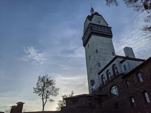 heublein tower against the sky in talcott mountain state park, an option for hiking trails in connecticut